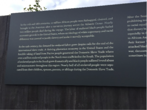 Sign presenting narrative of lynchings at memorial in Montgomery Alabama