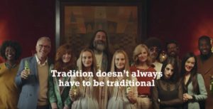 family in heineken commercial with caption "Tradition doesn't always have to be traditional"